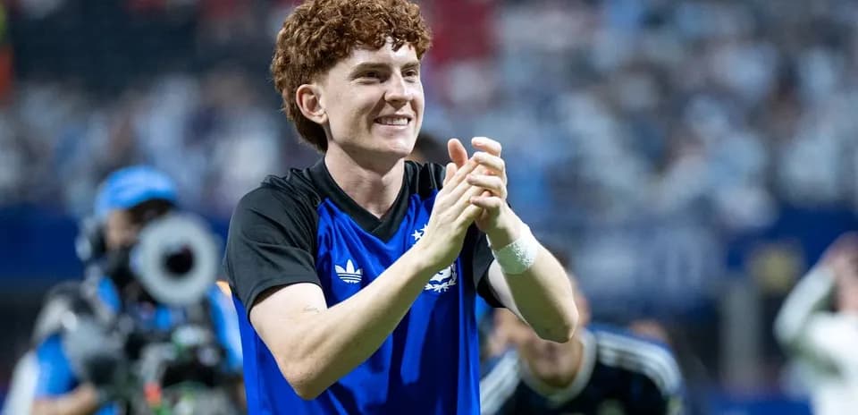 Player celebrating and clapping after the match