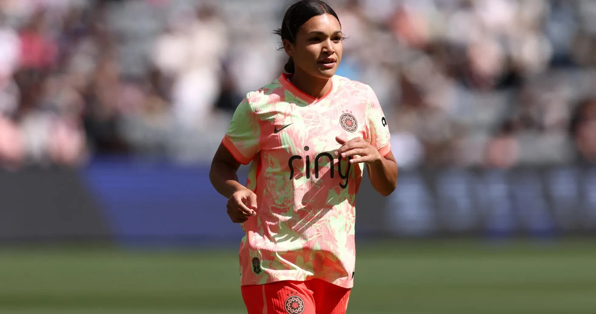 Player running on the field during match