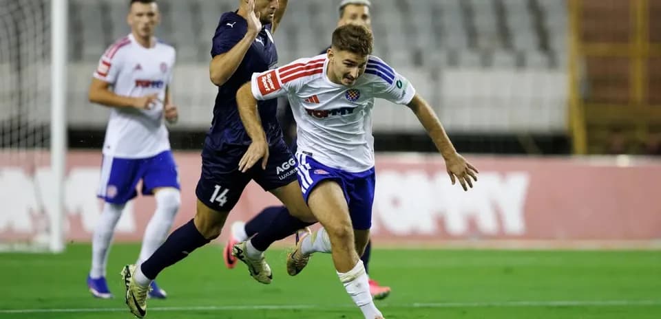 Player dribbling during Pafos vs Hajduk Split match