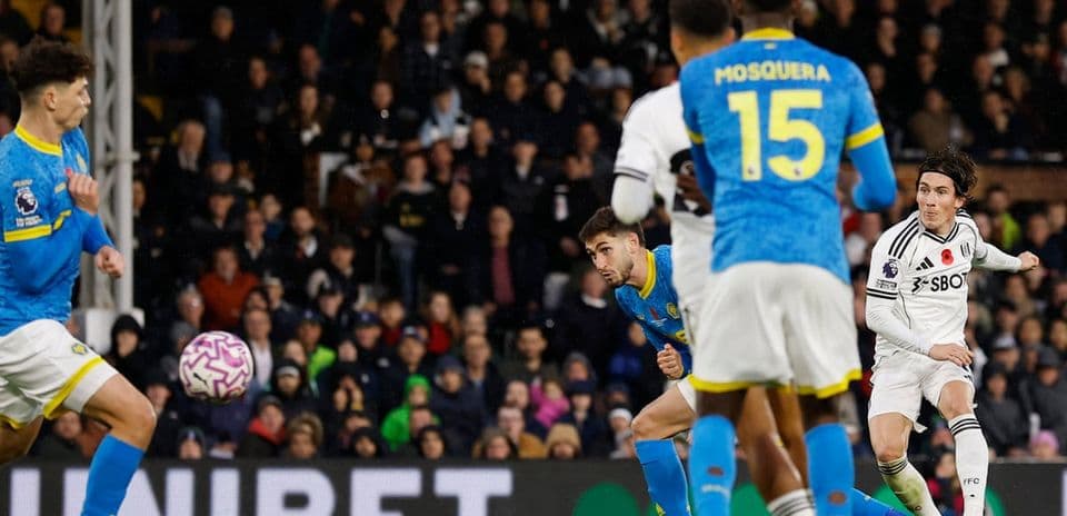 Fulham player shoots during Wolves match