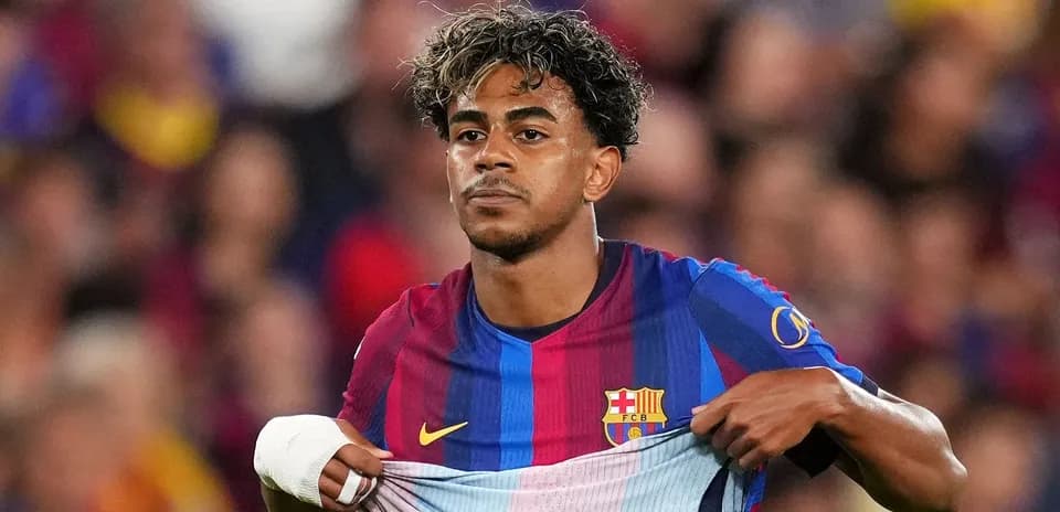 Player revealing Barcelona jersey during match
