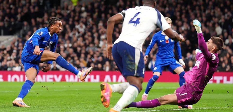 Chelsea player attempting a shot on goal