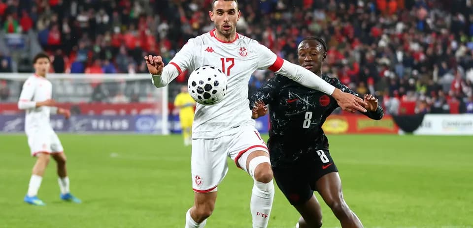 Players contesting for the ball during a match