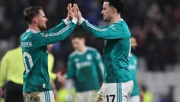 Two players celebrating during a match