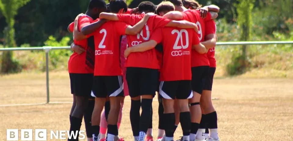 Team huddled together before a training session