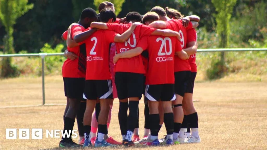 Team huddled together before a training session