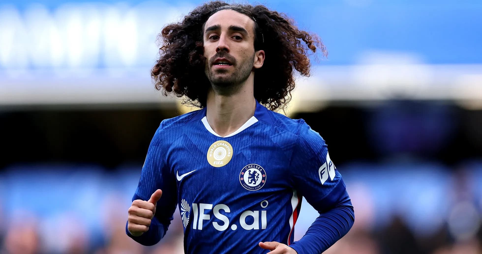 Chelsea player running on the pitch during match