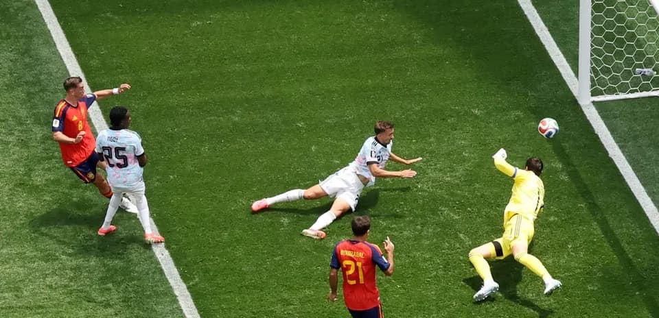 Player attempting to score while goalkeeper makes save