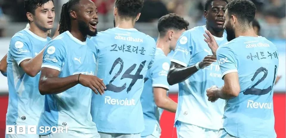 Players celebrating a goal during match
