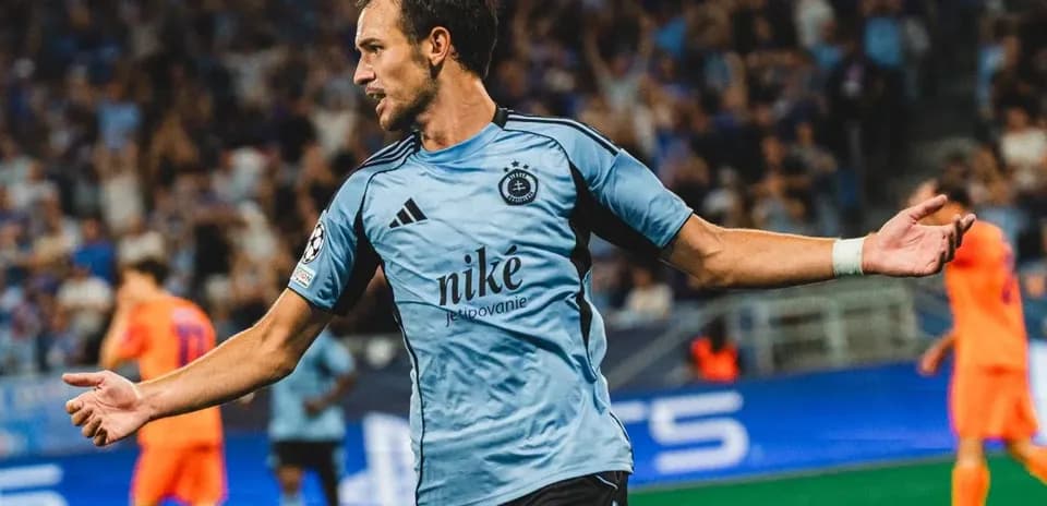 Player celebrating during Champions League match