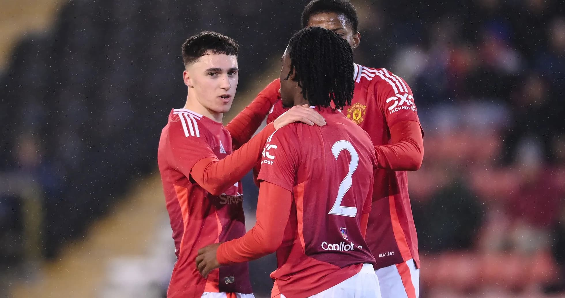 Manchester United players celebrating on the pitch