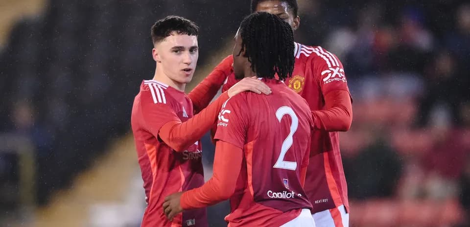 Manchester United players celebrating on the pitch