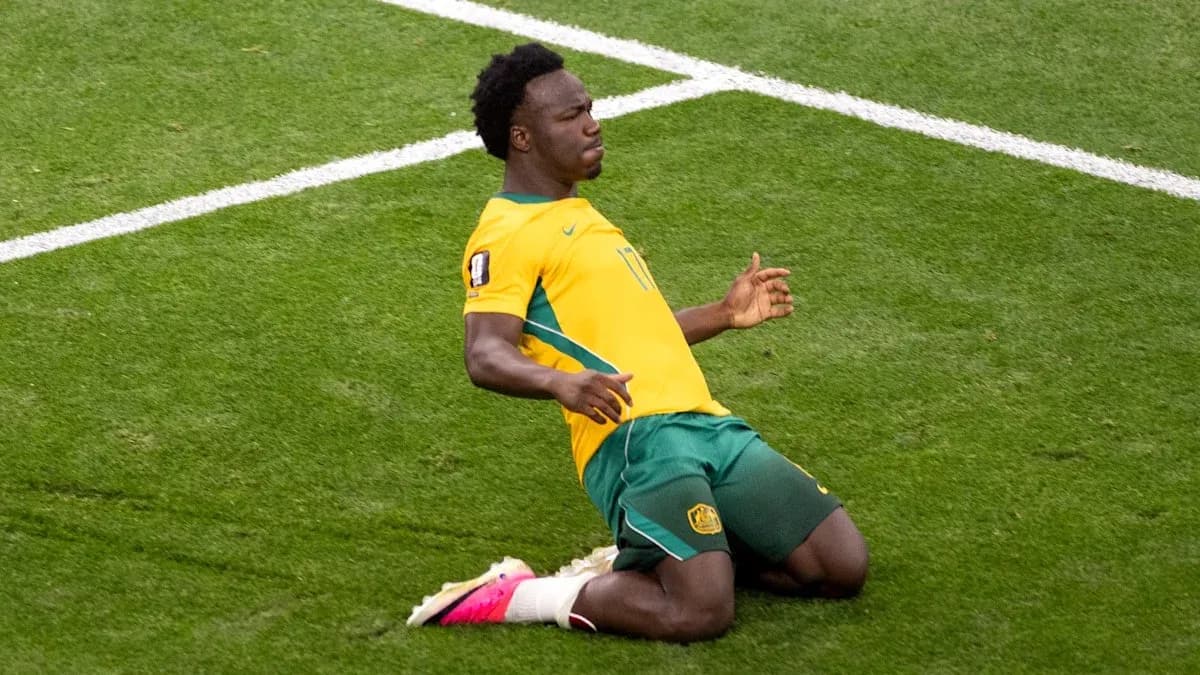 Player celebrating on the field after scoring