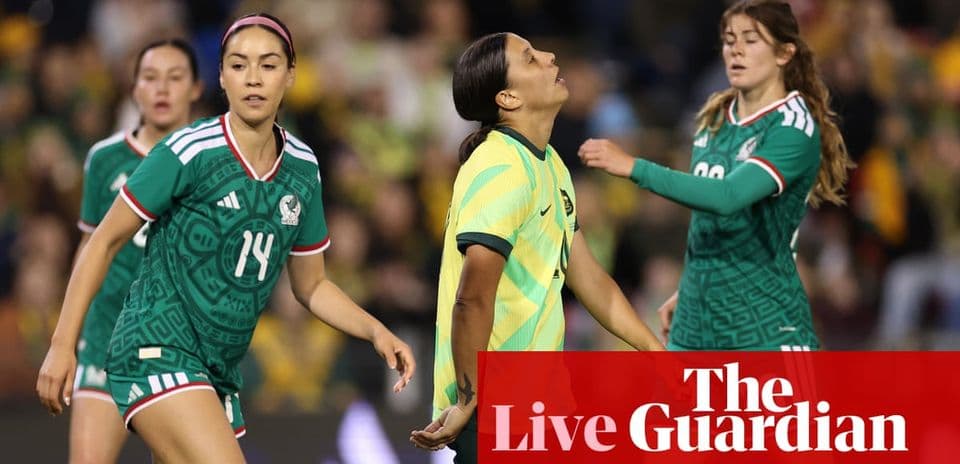 Players from Mexico and Australia during match action