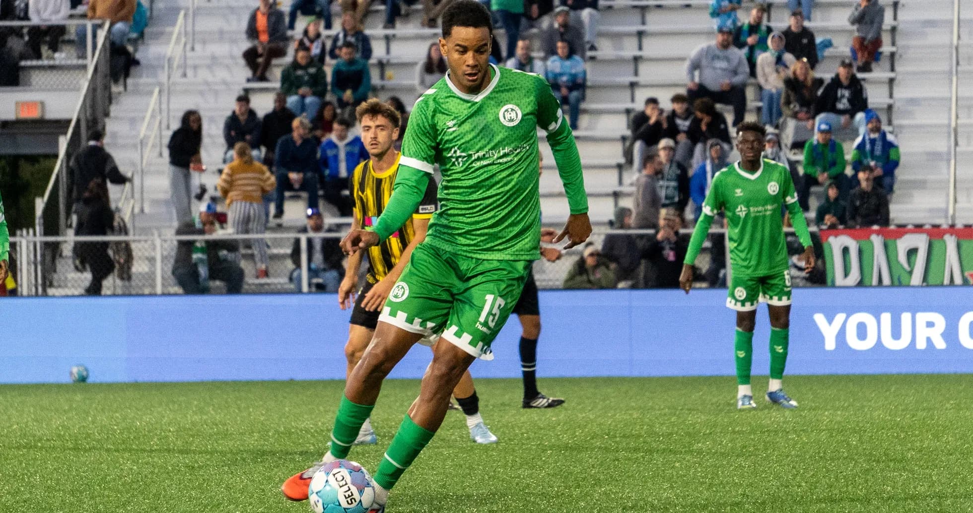 Hartford Athletic player preparing to kick ball