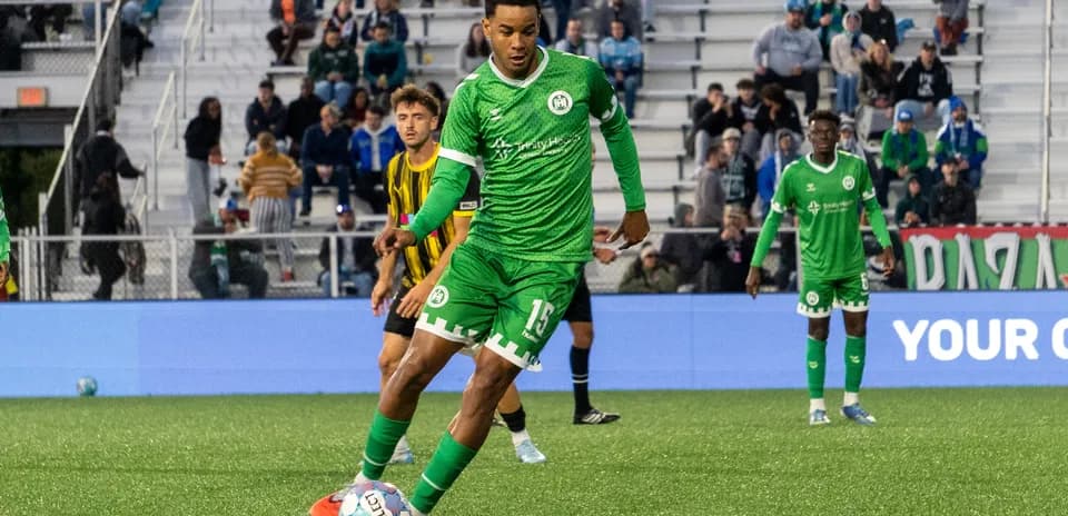 Hartford Athletic player preparing to kick ball