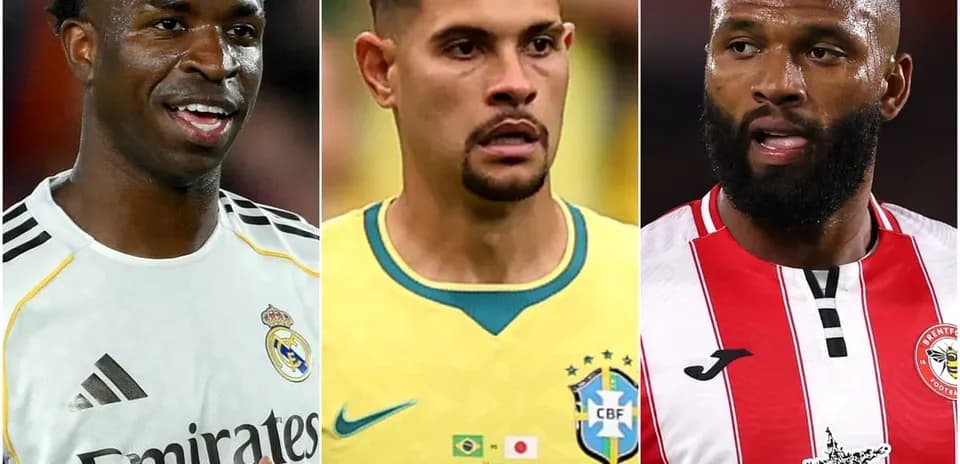 Three football players in their team jerseys