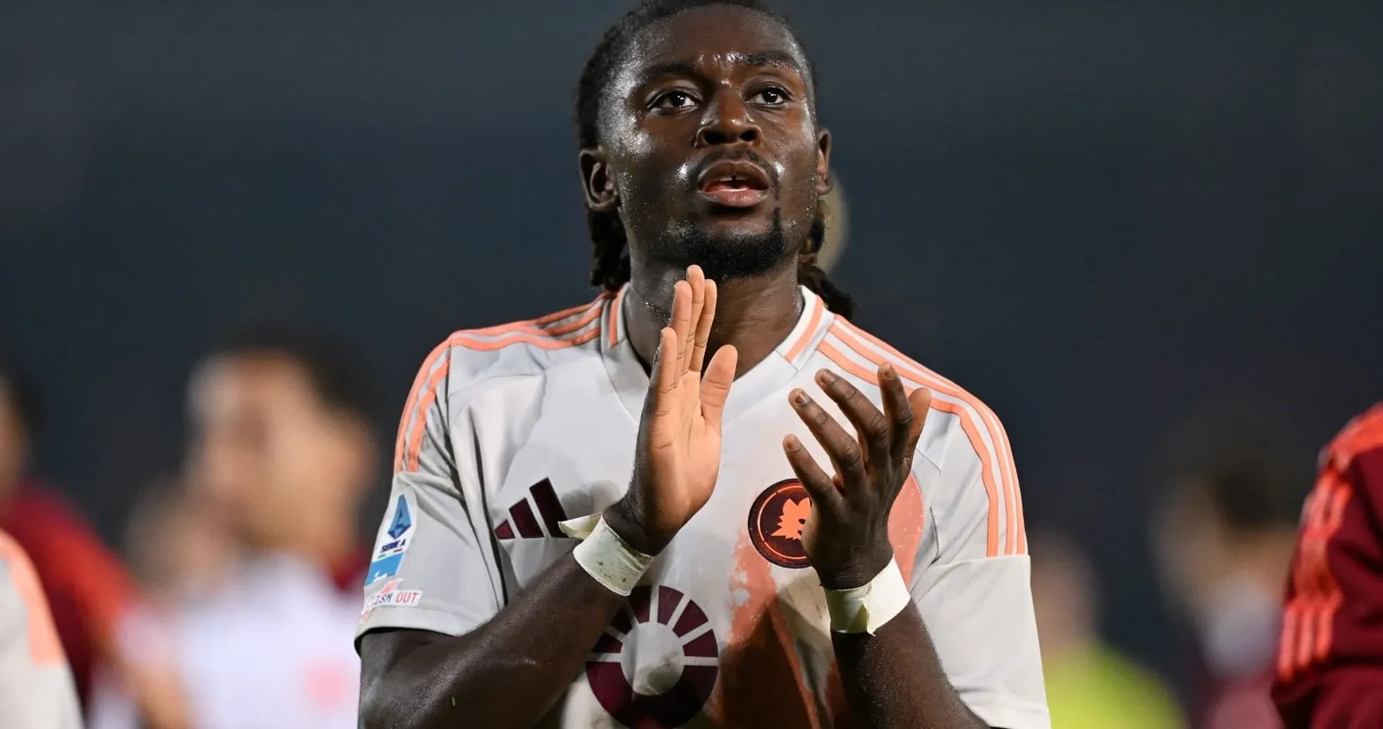Player applauding fans after the match