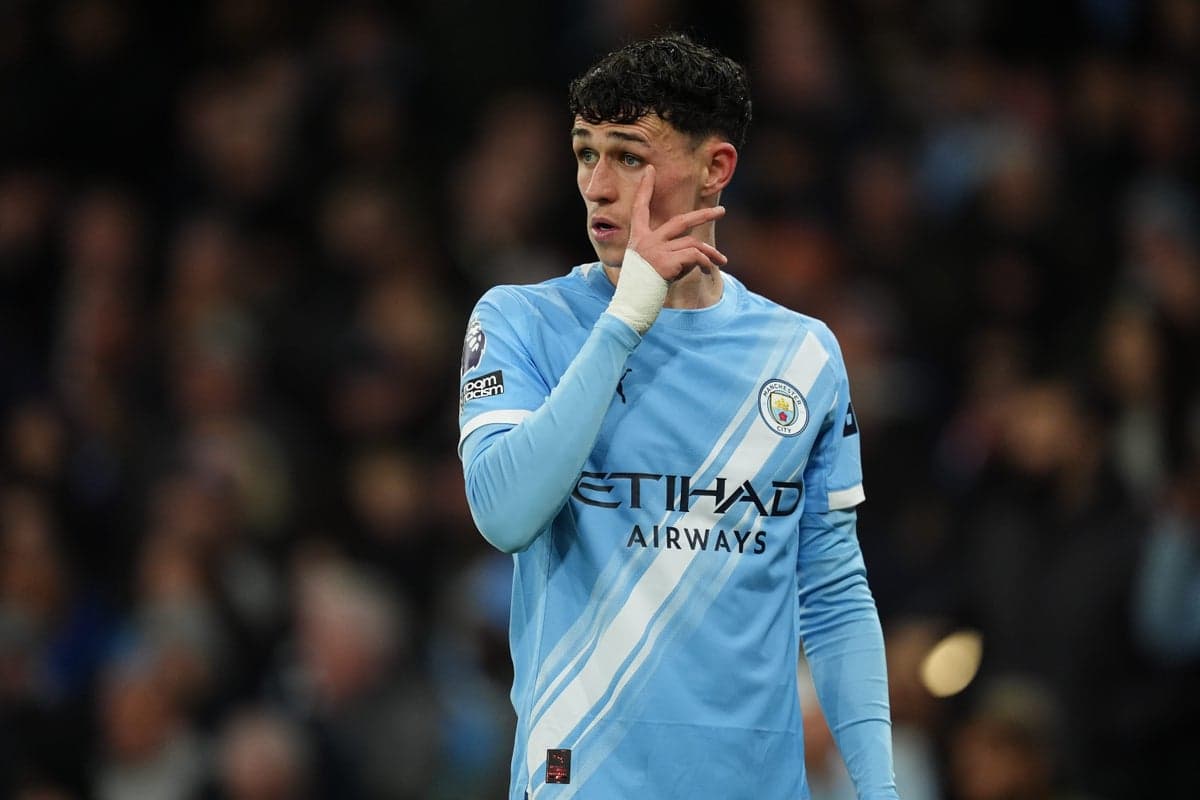 Player gesturing during match in light blue jersey