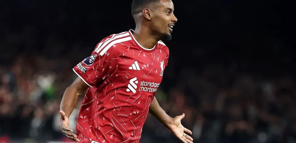 Player celebrating goal in Liverpool jersey