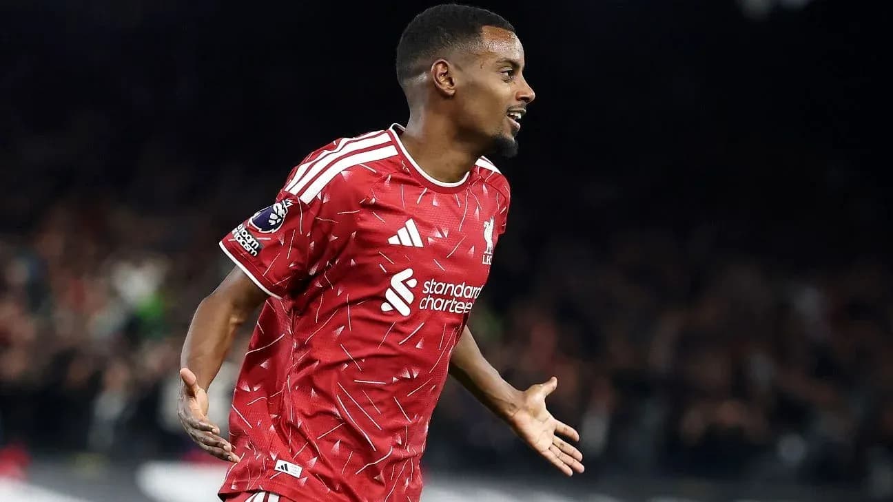 Player celebrating goal in Liverpool jersey