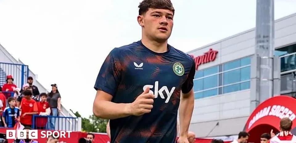 Player jogging onto the field before a match