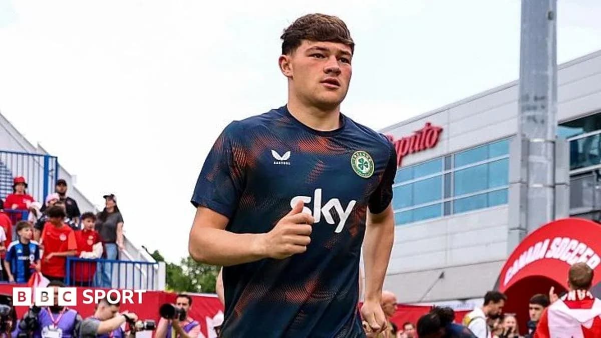 Player jogging onto the field before a match
