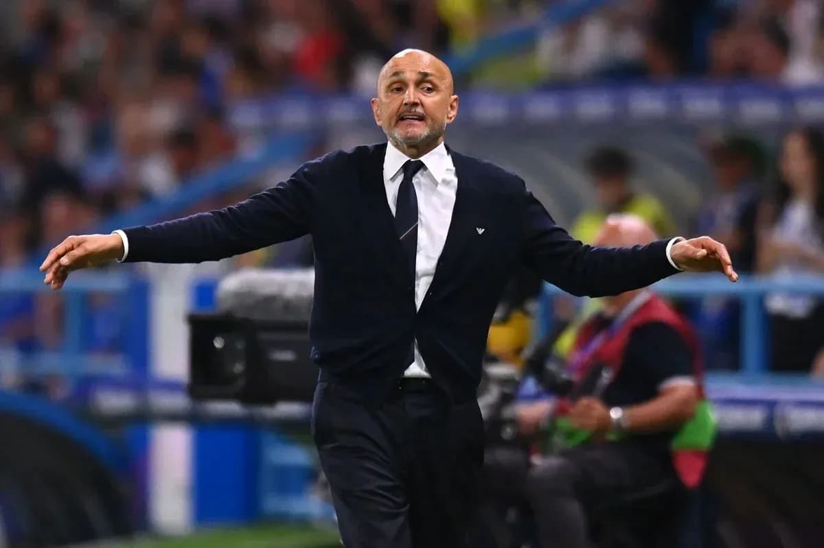 Coach gesturing during a match on the sidelines