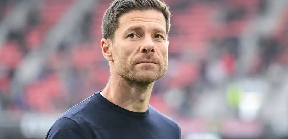 Coach looking on from the sidelines during match