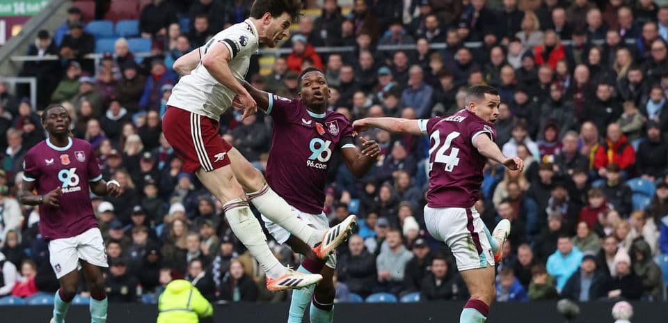 Arsenal player heading the ball against Burnley