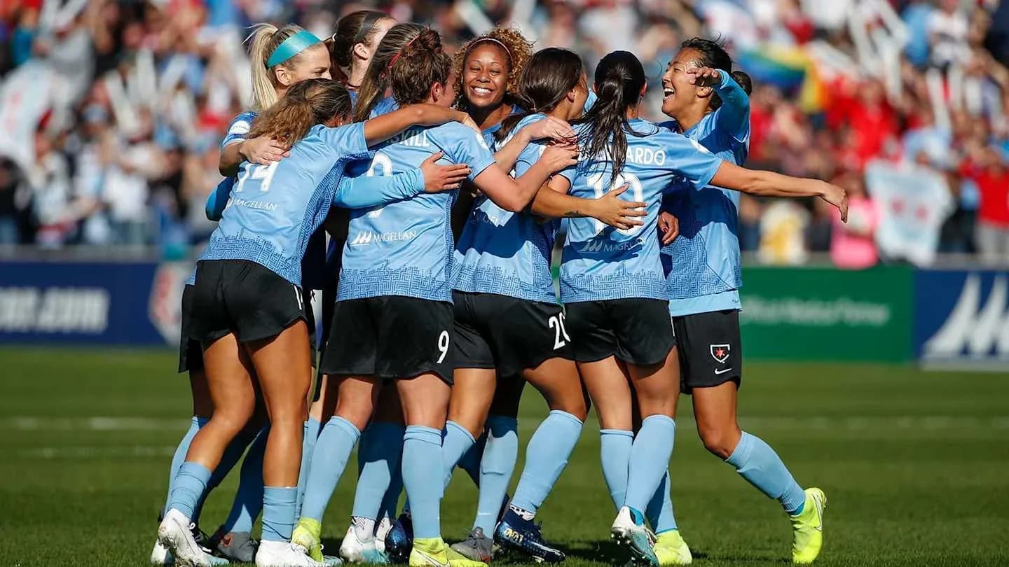 Chicago Red Stars celebrating after scoring a goal