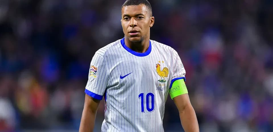 Player in France kit walking on the field