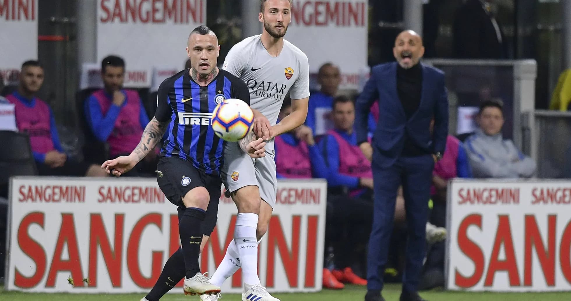 Inter Milan and Roma players contesting the ball