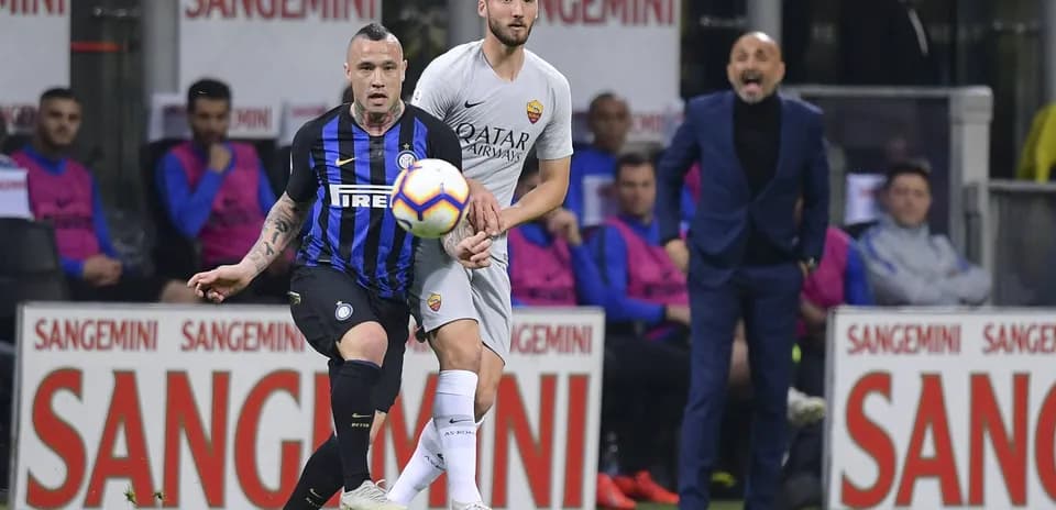 Inter Milan and Roma players contesting the ball