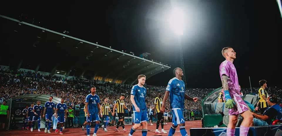 Levski Sofia players entering the field at night