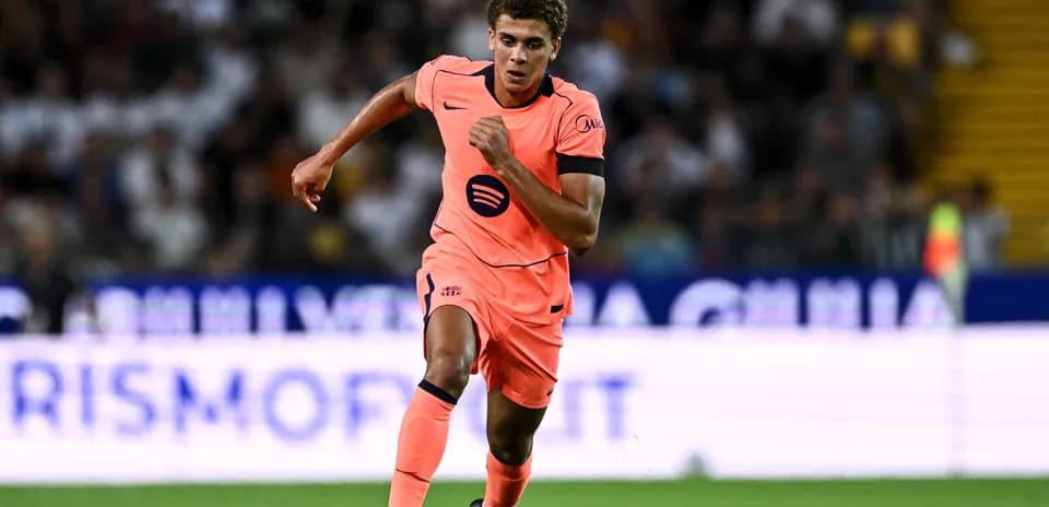 Player running with ball during a match