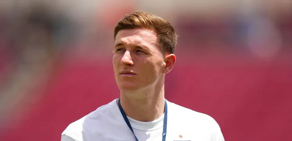 Player wearing England kit during match warm-up