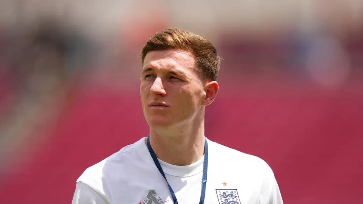 Player wearing England kit during match warm-up