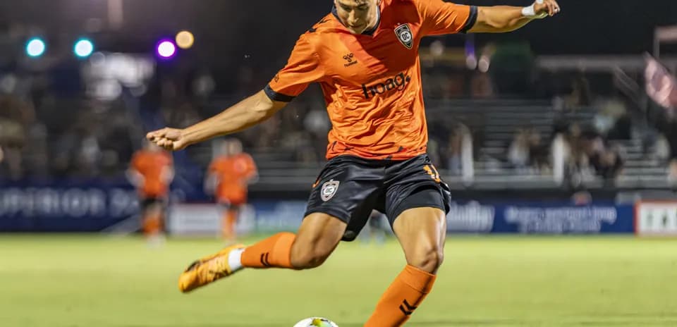 Player striking the ball during match