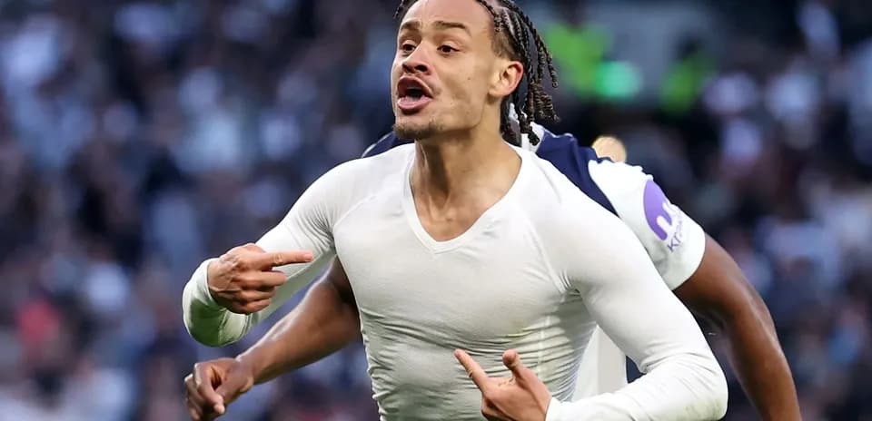 Player celebrating a goal with enthusiastic gestures