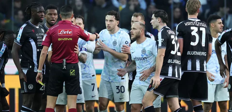 Players arguing with referee during Serie A match