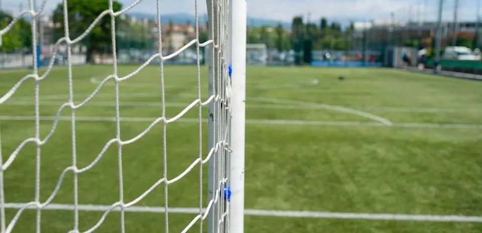 Close-up of soccer goal on training pitch