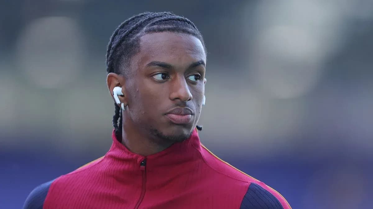 Player wearing earbuds during warm-up session