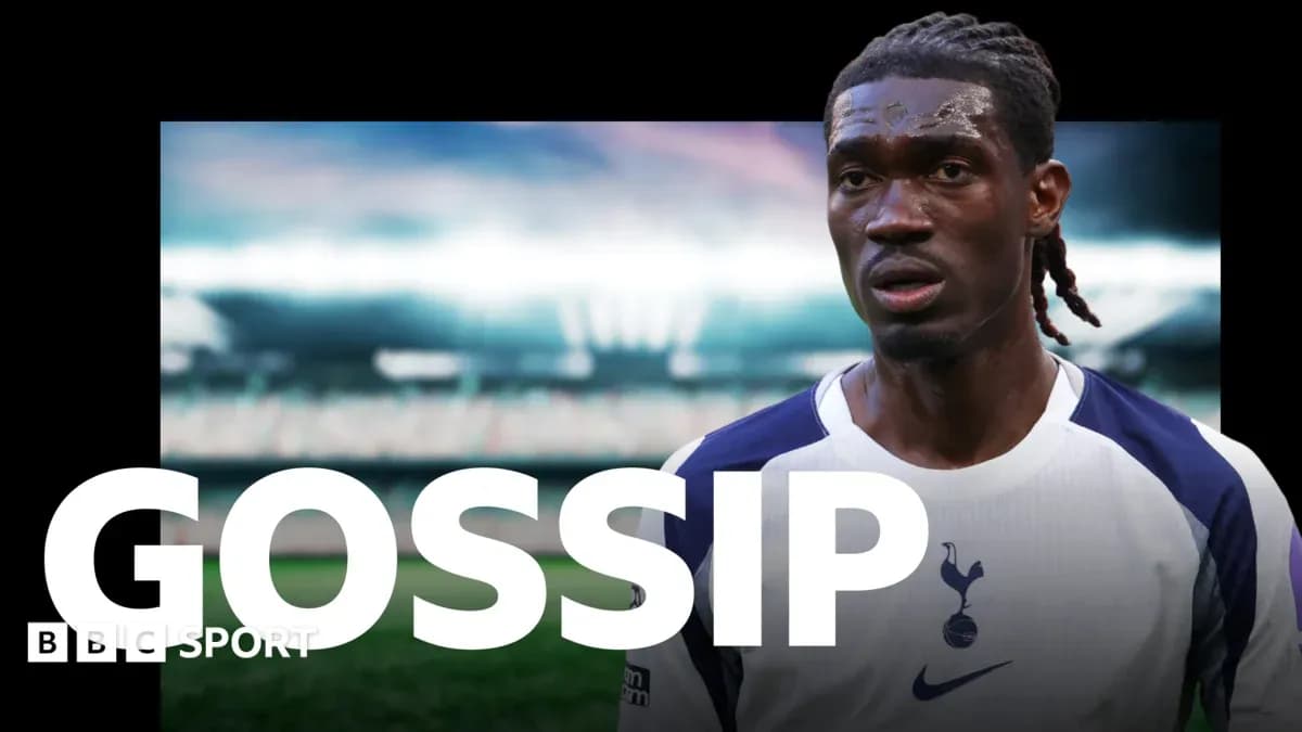 Player in Tottenham kit during match with stadium background