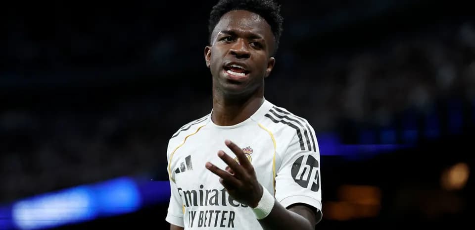 Player gesturing during a match for Real Madrid