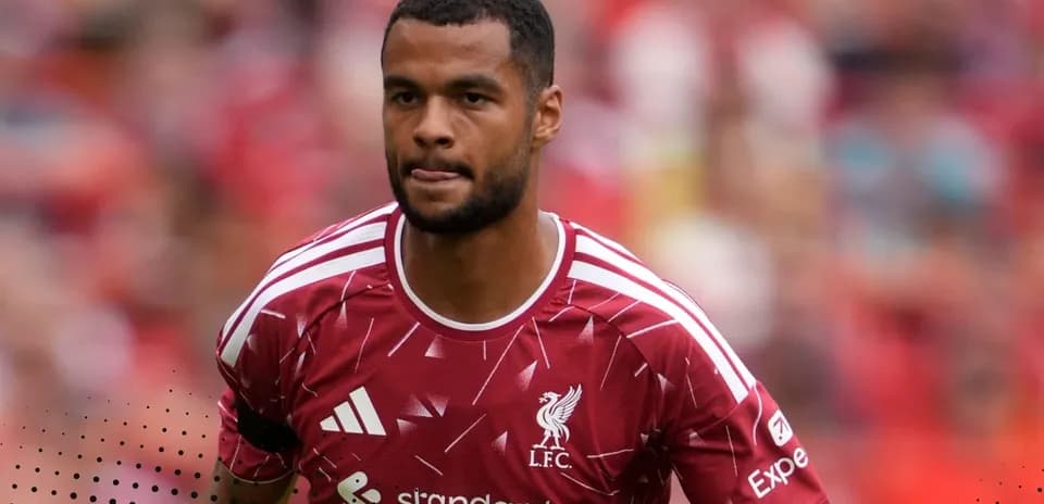 Player wearing Liverpool jersey during warm-up