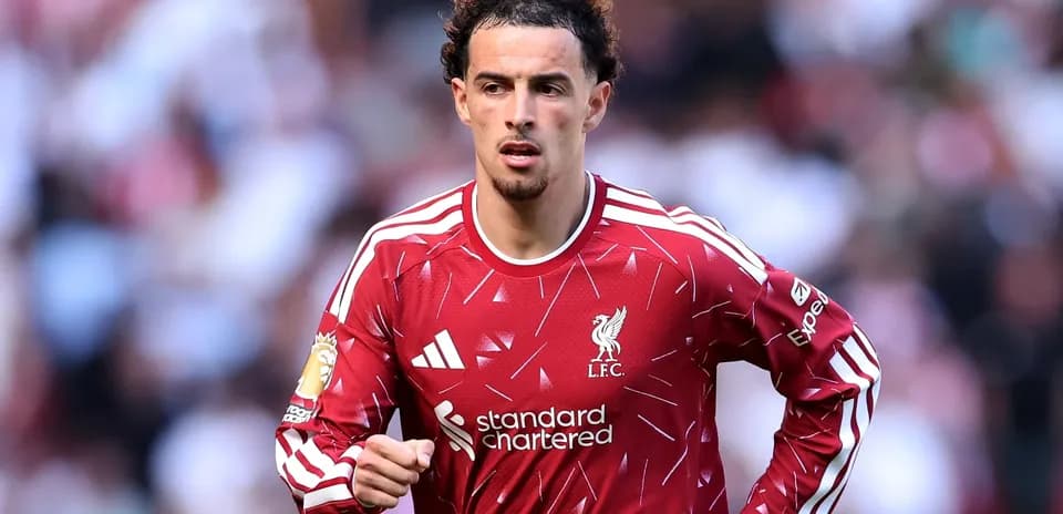 Player in Liverpool jersey during match action
