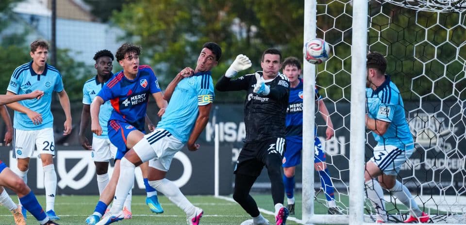 FC Cincinnati II players defending against a shot