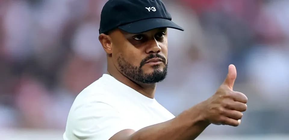 Man in cap giving thumbs up gesture