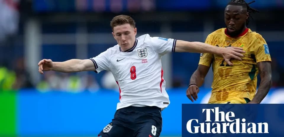 Player tackling opponent during international football match